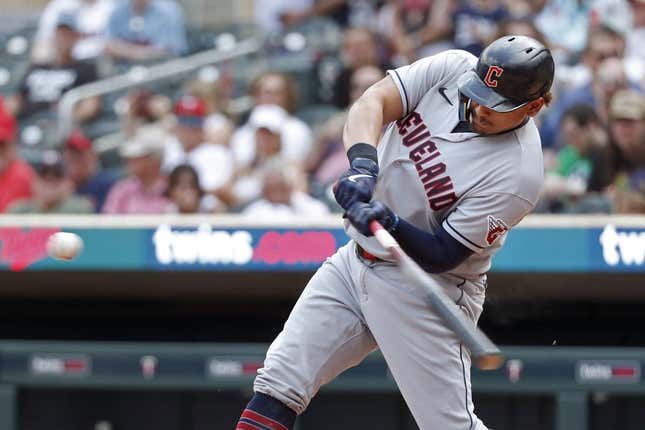 Jun 4, 2023; Minneapolis, Minnesota, USA; Cleveland Guardians designated hitter Josh Naylor (22) hits an RBI double against the Minnesota Twins in the seventh inning at Target Field.