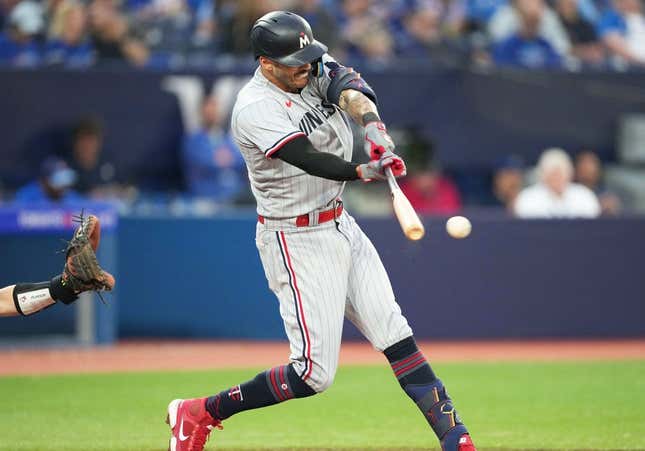 Jun 9, 2023; Toronto, Ontario, CAN; Minnesota Twins shortstop Carlos Correa (4) hits a single against the Toronto Blue Jays during the sixth inning at Rogers Centre.