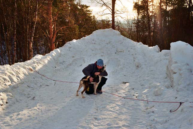 Falter with one of his dogs.