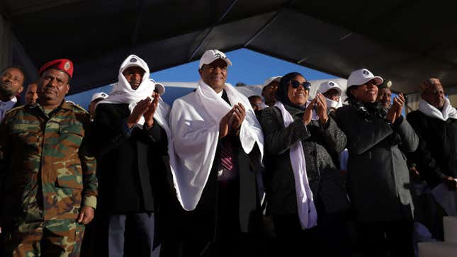 Ethiopians celebrate as they watch a live transmission of the Ethiopian ETRSS-1 Satellite launch into space at the Entoto Observatory and Research Center on the outskirts of Addis Ababa, Ethiopia Dec. 20, 2019.