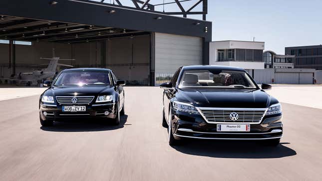 A photo of the original VW Phaeton driving alongside the Phaeton D2 concept car.