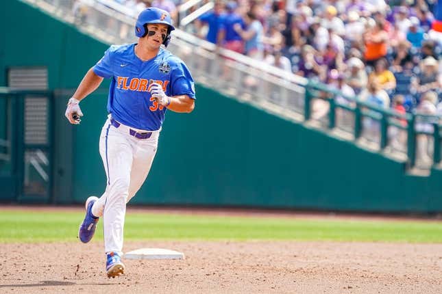 June 25, 2023;  Omaha, NE, USA;  Florida Gators center fielder Wyatt Langford (36) rounds the bases after hitting a three-run home run against the LSU Tigers during the sixth inning at Charles Schwab Field in Omaha.