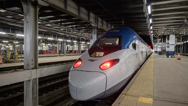 A photo of an Amtrak high speed train in a station. 