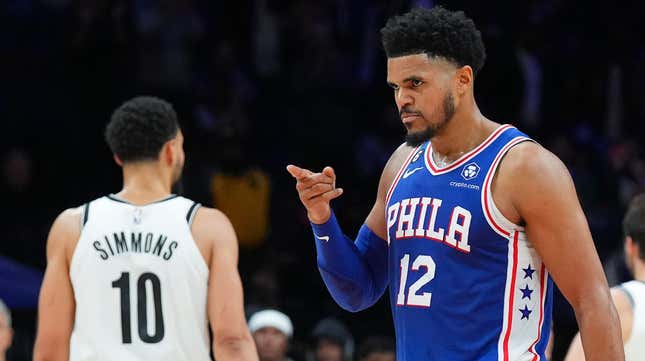 Tobias Harris reacts in front of Ben Simmons at the Wells Fargo Center on Nov. 22, 2022, in Philadelphia. 