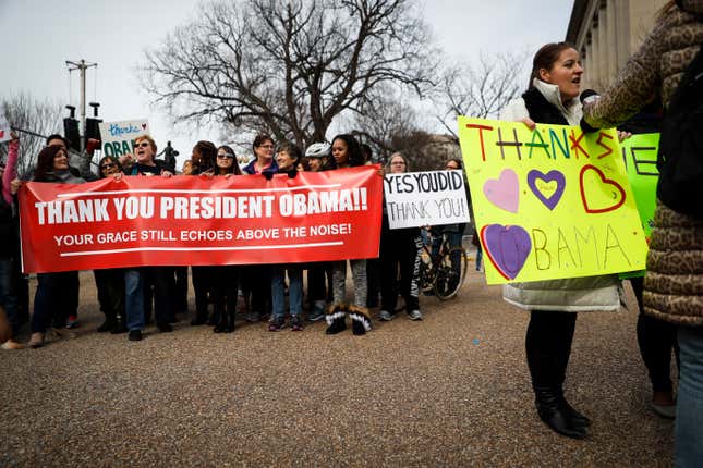 Demonstrators gather near the White House in Washington, Thursday, Jan. 19, 2017, to thank outgoing President Barack Obama.