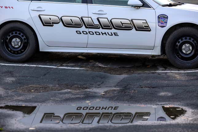 A Goodhue police car is parked outside City Hall on Monday, Aug. 14, 2023, in Goodhue, Minn. The small town will soon be without a police department, an exodus spurred by low pay for the chief and his officers. (Carlos Gonzalez/Star Tribune via AP)