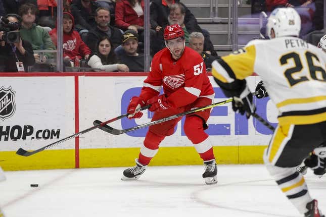 Mar 28, 2023; Detroit, Michigan, USA; Detroit Red Wings left wing David Perron (57) handles the puck during the second period against the Pittsburgh Penguins at Little Caesars Arena.