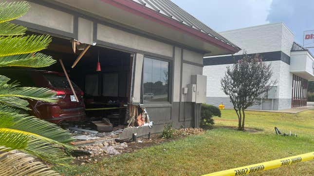  police tape in front of a Denny’s restaurant after a vehicle crashed into it in Rosenberg, Texas, Monday, Sept. 4, 2023