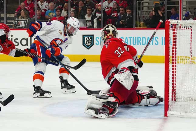 Apr 25, 2023; Raleigh, North Carolina, USA; New York Islanders center Brock Nelson (29) shoots against Carolina Hurricanes goaltender Antti Raanta (32) during the second period in game five of the first round of the 2023 Stanley Cup Playoffs at PNC Arena.