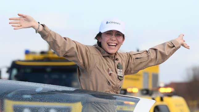 Belgian-British teenage pilot Zara Rutherford, aboard her a Shark ultralight, reacts after landing back at the end of her solo round-the-world trip in her Belgian hometown of Kortrijk on January 20, 2022.
