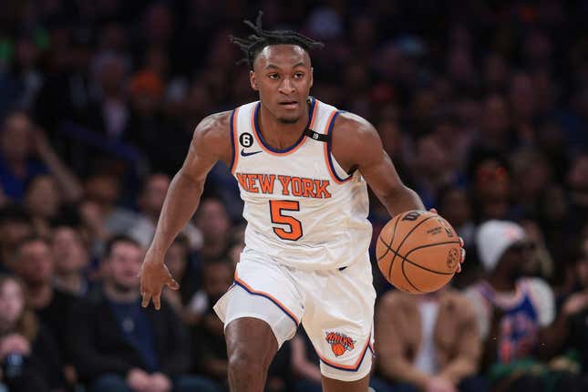 Apr 2, 2023; New York, New York, USA; New York Knicks guard Immanuel Quickley (5) dribbles up court during the first quarter against the Washington Wizards at Madison Square Garden.
