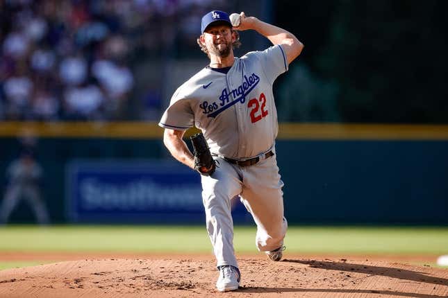 Jun 27, 2023; Denver, Colorado, USA; Los Angeles Dodgers starting pitcher Clayton Kershaw (22) pitches in the first inning against the Colorado Rockies at Coors Field.