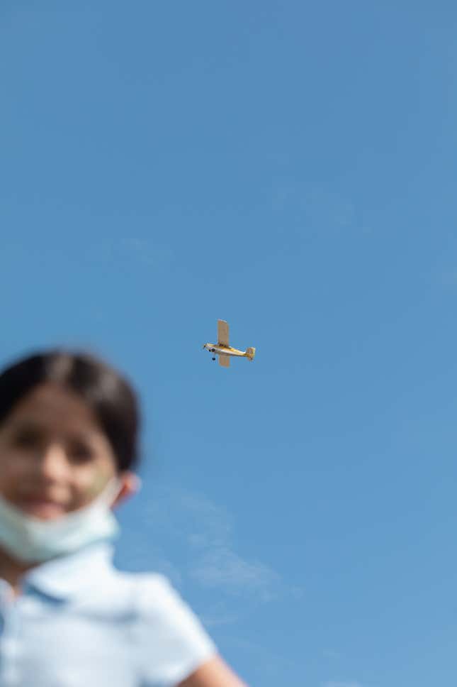 Playing near the planes in San Jose, California.