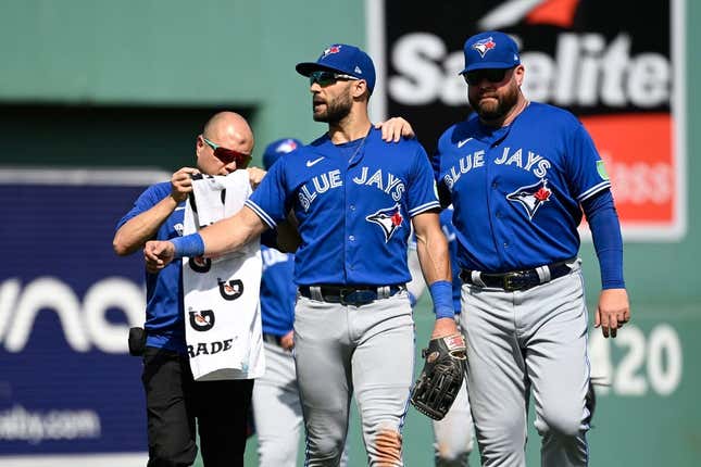 Aug 6, 2023; Boston, Massachusetts, USA; Toronto Blue Jays center fielder Kevin Kiermaier (39) gets medical attention to his left arm during the sixth inning against the Boston Red Sox at Fenway Park.