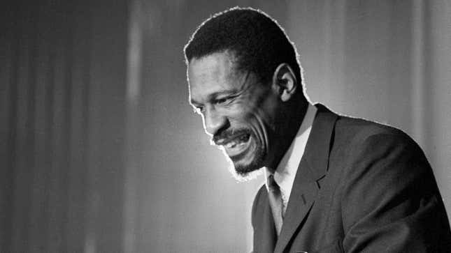 Bill Russell grins at the announcement that he had been named coach of the Boston Celtics basketball team, on April 18, 1966. The NBA great Bill Russell died at age 88. 