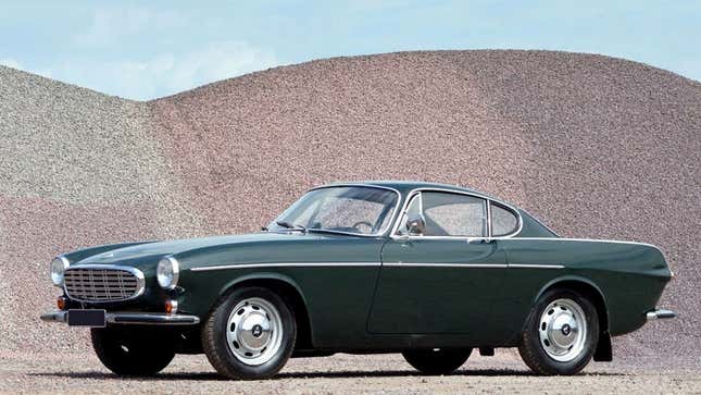 A photo of a green Volvo P1800 coupe. 