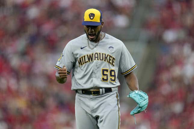 The Milwaukee Brewers score two runs on a pair of fielder's choice  grounders in 11th inning to eke out win over Cincinnati Reds