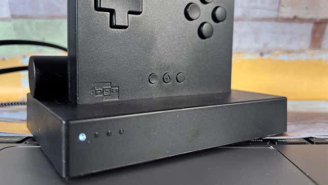 A photo of a docked Analogue Pocket.