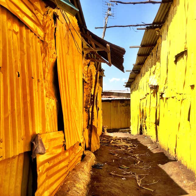 Image for article titled An artist has painted mosques and churches across Kenya yellow to promote peace