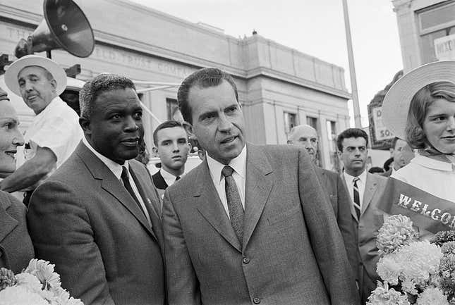 Vice President Richard M. Nixon (right) chats with former baseball star Jackie Robinson during a stop in the Republican presidential candidate’s sweep through northern New Jersey.