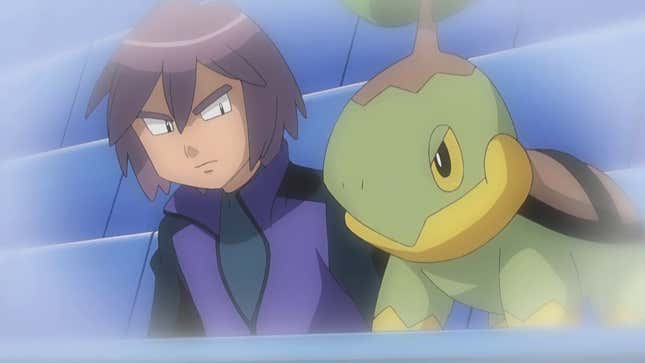 Turtwig is seen standing next to Paul in stadium seats.