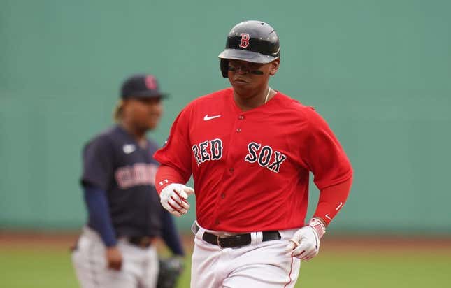 Apr 29, 2023; Boston, Massachusetts, USA; Boston Red Sox third baseman Rafael Devers (11) rounds the bases after hitting a three run home run against the Cleveland Guardians in the first inning at Fenway Park.