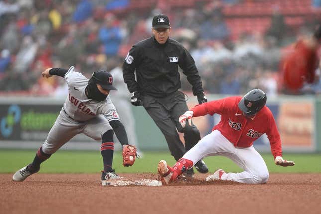 Apr 30, 2023; Boston, Massachusetts, USA; Boston Red Sox second baseman Enmanuel Valdez (47) slides into second base for a double against the Cleveland Guardiansduring the eighth inning at Fenway Park.