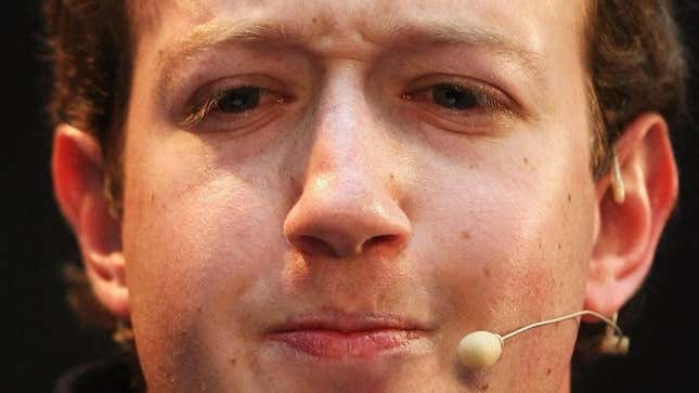A young Mark Zuckerberg wearing a microphone