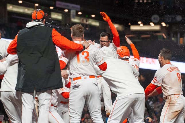 Apr 25, 2023; San Francisco, California, USA;  San Francisco Giants catcher Blake Sabol (2) celebrates with teammates after hitting a walk off home run during the ninth inning against the St. Louis Cardinals at Oracle Park.