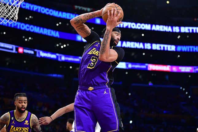 Apr 7, 2023; Los Angeles, California, USA; Los Angeles Lakers forward Anthony Davis (3) gets the rebound against the Phoenix Suns during the second half at Crypto.com Arena.