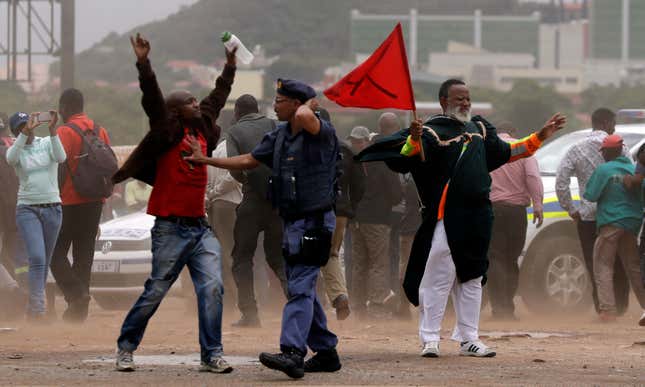 Photos: An anti-immigration march in South Africa sparks violence