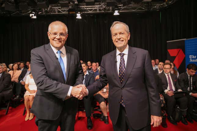 Australian Prime Minister Scott Morrison and opposition leader Bill Shorten shake hands at the Seven West Media Studios in Perth, Australia, April 29, 2019.