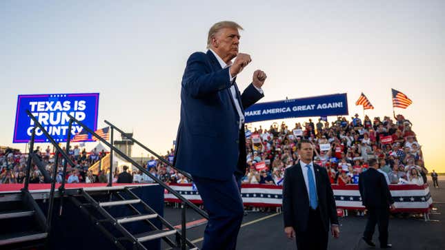 Former U.S. President Donald Trump dances while exiting after speaking during a rally at the Waco Regional Airport on March 25, 2023 in Waco, Texas.