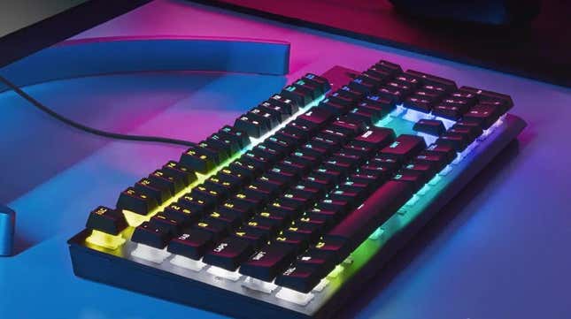 A mechanical keyboard lights up in preparation for the next Overwatch 2 rave.