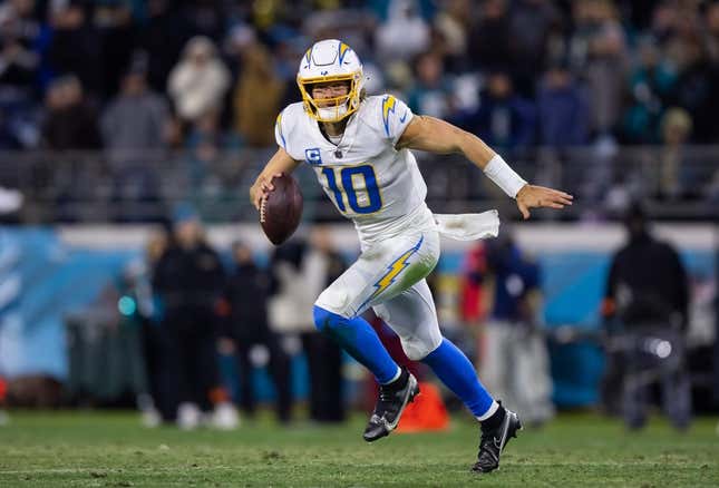 Jan 14, 2023; Jacksonville, Florida, USA; Los Angeles Chargers quarterback Justin Herbert (10) against the Jacksonville Jaguars during a wild card playoff game at TIAA Bank Field.