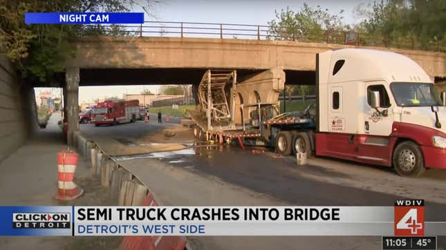 Image for article titled Crane On Semi Hits Low Bridge Hard Enough To Bend Trailer In Half