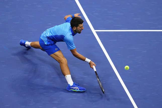 Sep 10, 2023; Flushing, NY, USA; Novak Djokovic of Serbia reaches for a forehand against Daniil Medvedev (not pictured) in the men&#39;s singles final in the men&#39;s singles final on day fourteen of the 2023 U.S. Open tennis tournament at USTA Billie Jean King National Tennis Center.