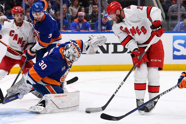Apr 23, 2023; Elmont, New York, USA; Carolina Hurricanes right wing Stefan Noesen (23) plays the puck in front of New York Islanders goaltender Ilya Sorokin (30) during the first period in game four of the first round of the 2023 Stanley Cup Playoffs at UBS Arena.
