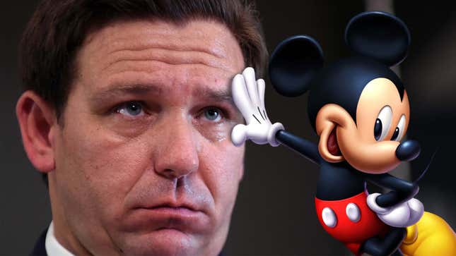 A photo of DeSantis shows him looking at Mickey Mouse. 