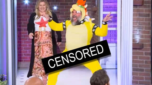 Jack Black in a Bowser outfits stands in front of a woman with his crotch censored via a big black bar. 