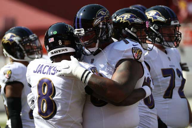 Oct 4, 2020; Landover, Maryland, USA; Baltimore Ravens quarterback Lamar Jackson (8) hugs Ravens offensive tackle Orlando Brown (78) during warmups prior to the Ravens&#39;game against the Washington Football Team at FedExField.