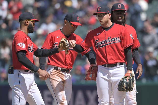 Apr 26, 2023; Cleveland, Ohio, USA; Cleveland Guardians starting pitcher Tanner Bibee, second right, celebrates with shortstop Amed Rosario, left, second baseman Andres Gimenez, second left, and first baseman Josh Bell during the sixth inning against the Colorado Rockies at Progressive Field.