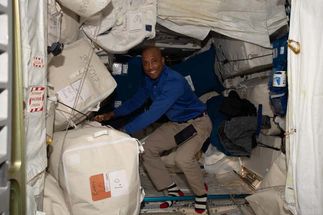 Glover sorting through cargo on the ISS, November 30, 2022. 