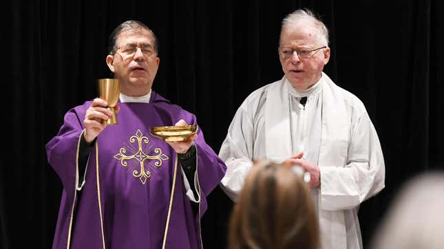 ORLANDO, FLORIDA, UNITED STATES - 2021/02/27: Father Frank Pavone, National Director of Priests for Life (left), celebrates Catholic Mass for attendees at the 2021 Conservative Political Action Conference at the Hyatt Regency. Former U.S. President Donald Trump is scheduled to speak on the final day of the conference. (Photo by Paul Hennessy/SOPA Images/LightRocket via Getty Images)