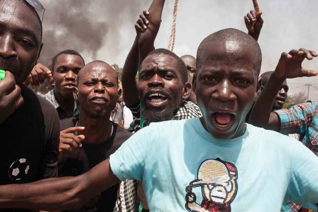 Burkina Faso protestors shout out as they take to the streets in Ouagadougou.