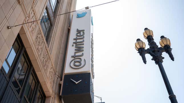 The Twitter logo is seen outside its San Francisco headquarters.