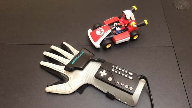 Tech modder figures he might as well rig up a Nintendo Power Glove to his Switch and play <i>Mario Kart</i>