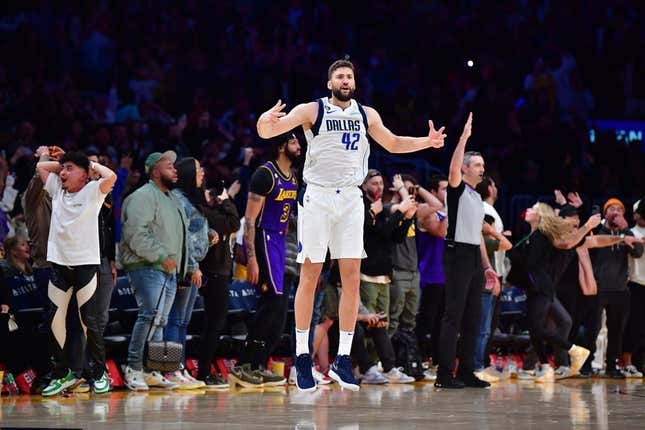 Mar 17, 2023; Los Angeles, California, USA; Dallas Mavericks forward Maxi Kleber (42) reacts after scoring a three point basket against Los Angeles Lakers forward Anthony Davis (3) for the game victory during the second half at Crypto.com Arena.