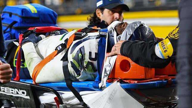 Seattle’s Darren Taylor was taken off the field on a backboard Sunday night.