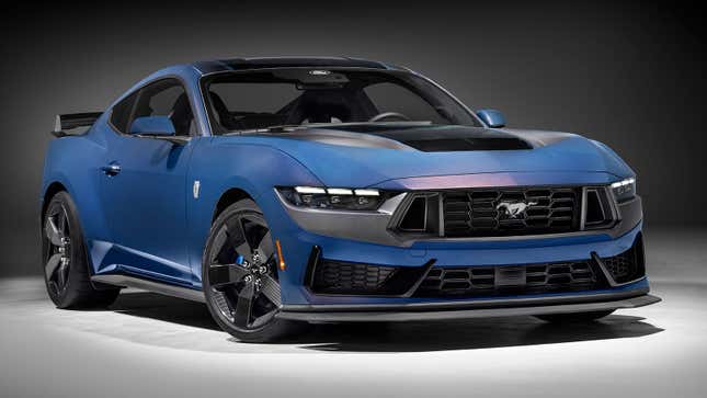 A photo of a blue Ford Mustang Dark Horse. 